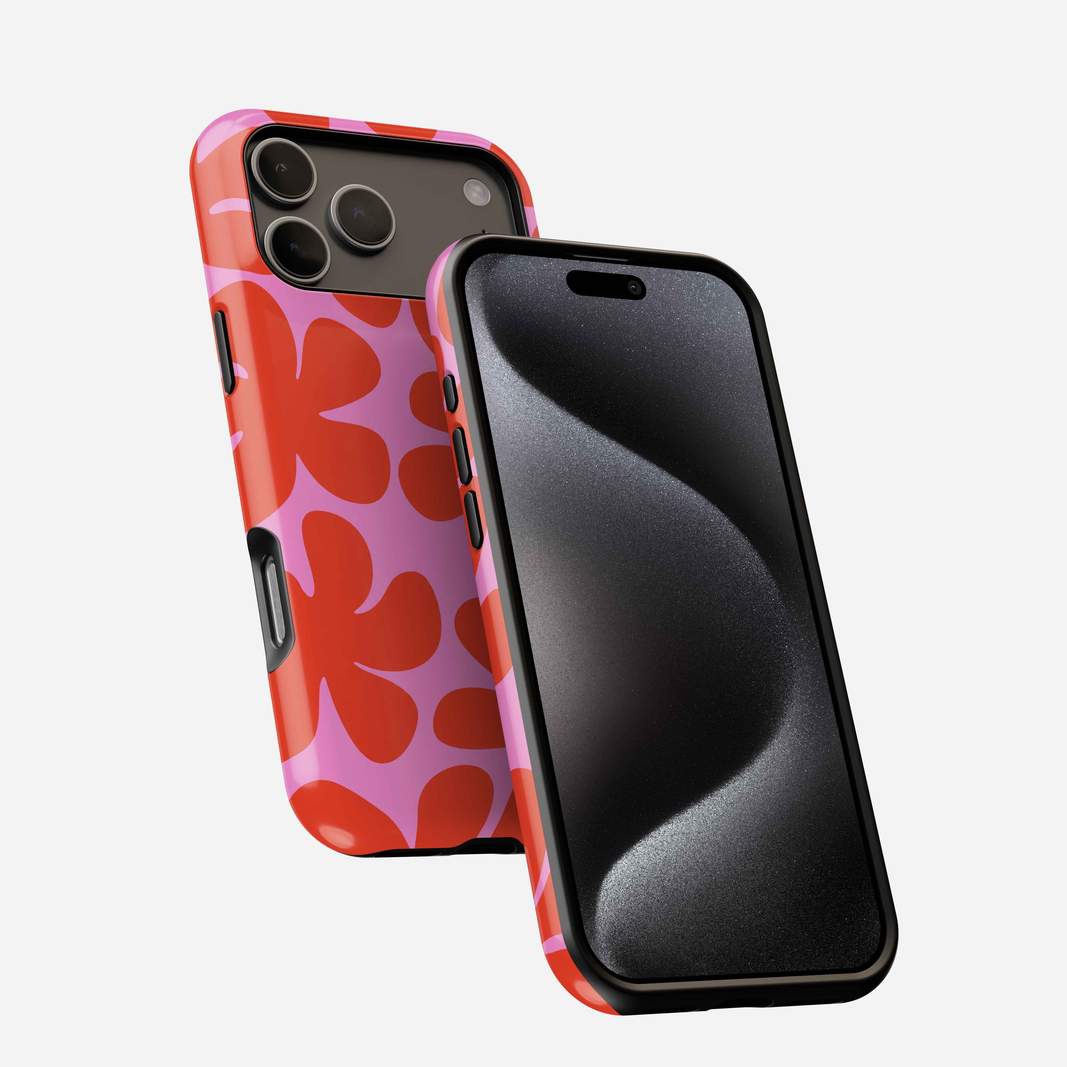Hot Papercut MagSafe Tough Phone Case with red floral pattern on pink background, shown front and back views.