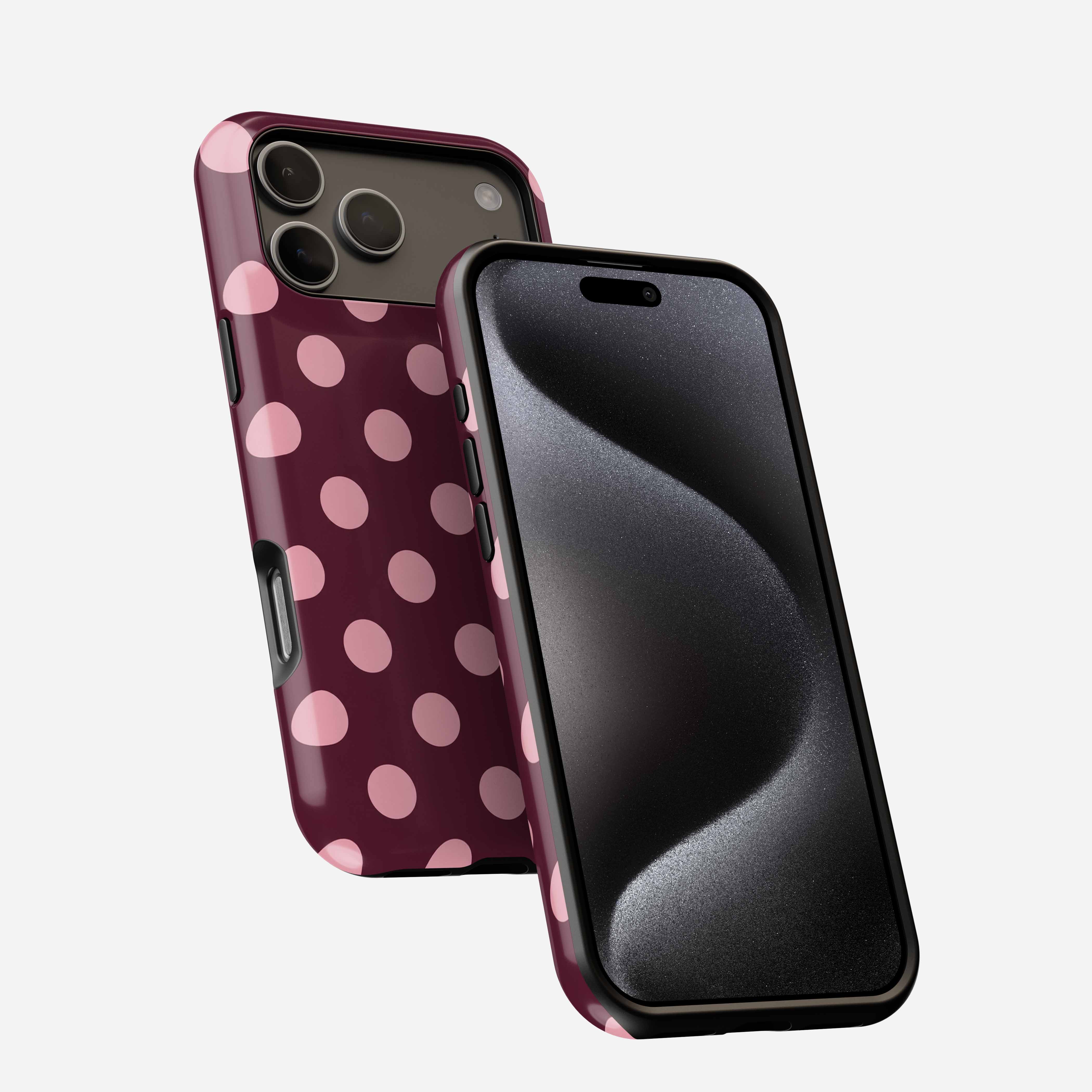 Cherry Soda MagSafe Tough Phone Case with burgundy polka dot pattern, shown on iPhone from front and back angles.