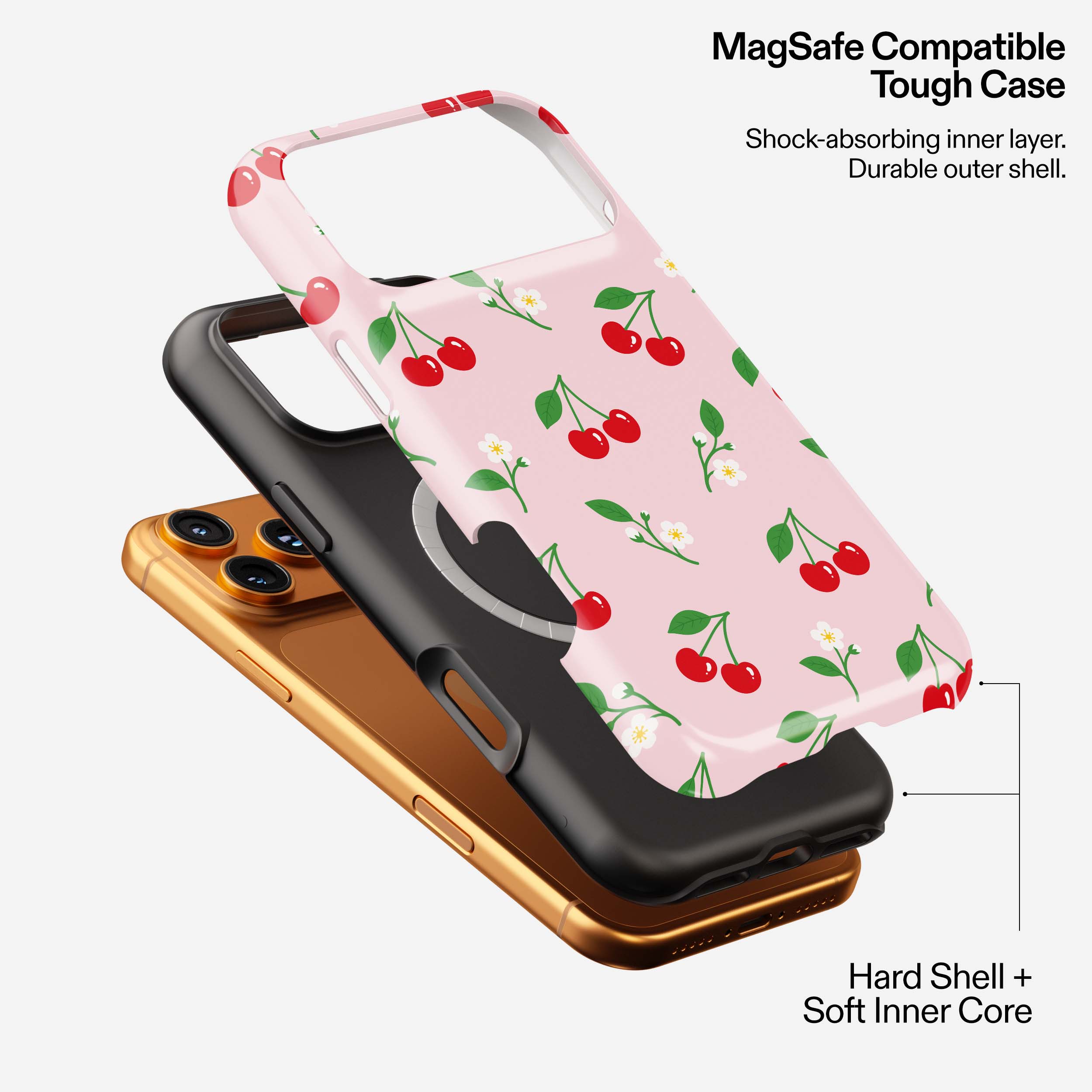 Pink MagSafe phone case with cherry and flower pattern, showing hard shell and soft inner core layers in black and gold.