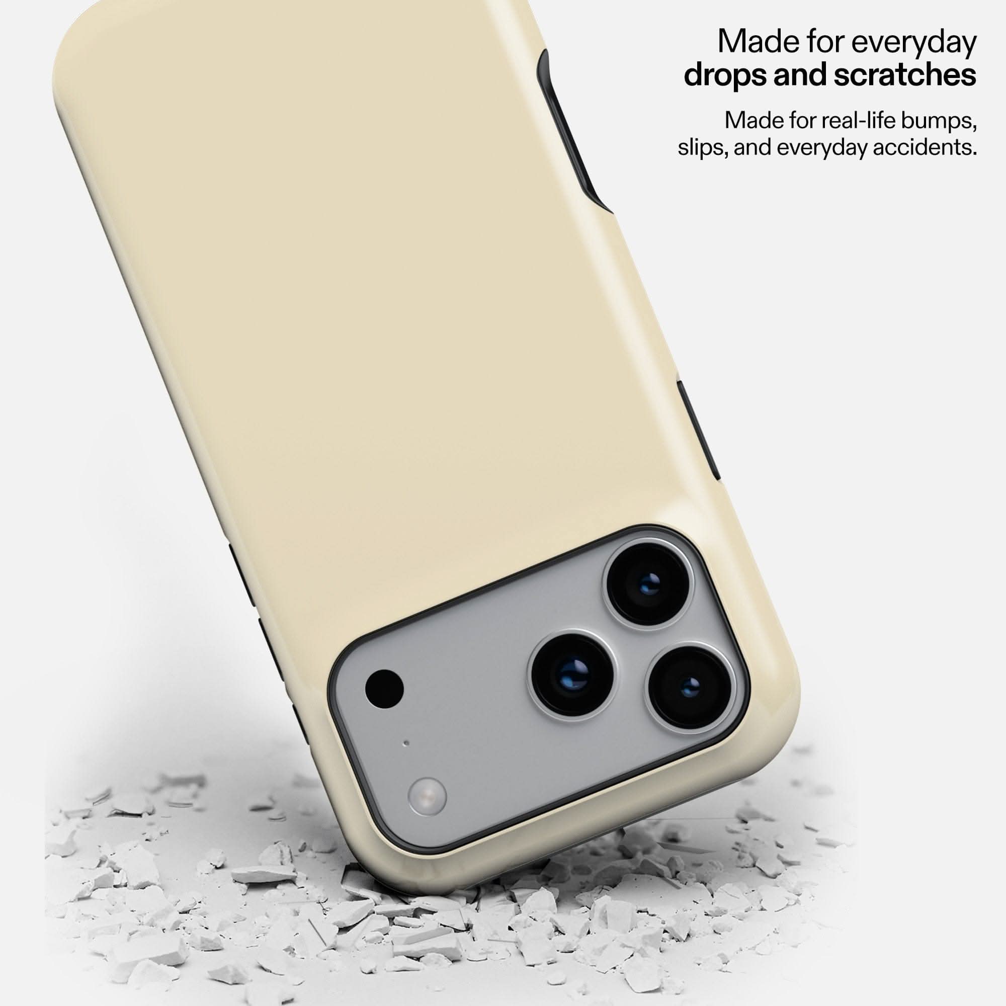 Butter yellow MagSafe tough phone case on marble surface with protective messaging text.